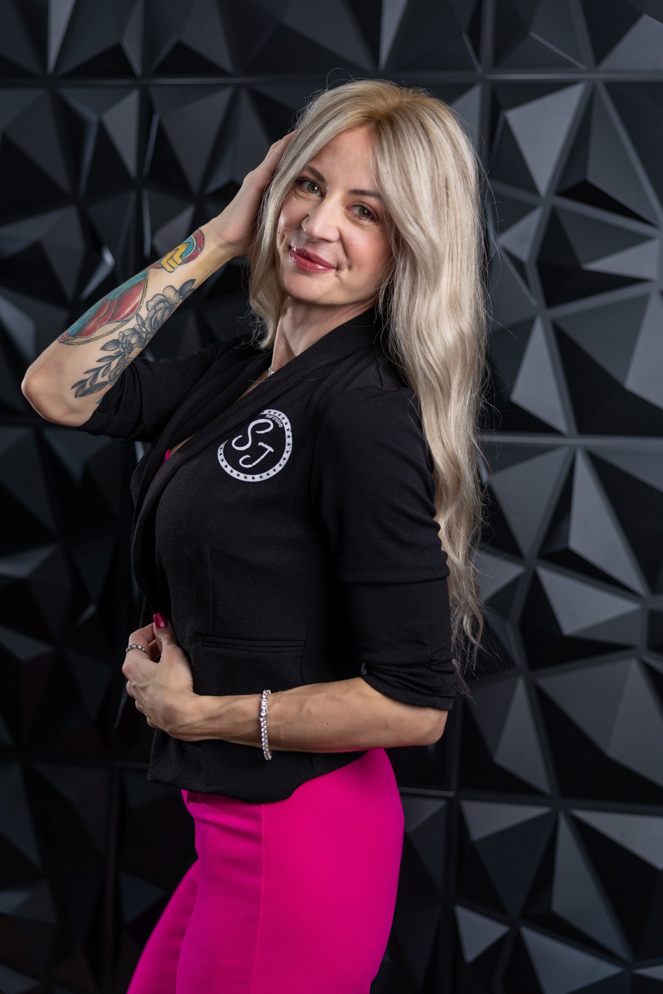 Smiling boudoir-style portrait at Studio SJ in Neenah, Wisconsin.
