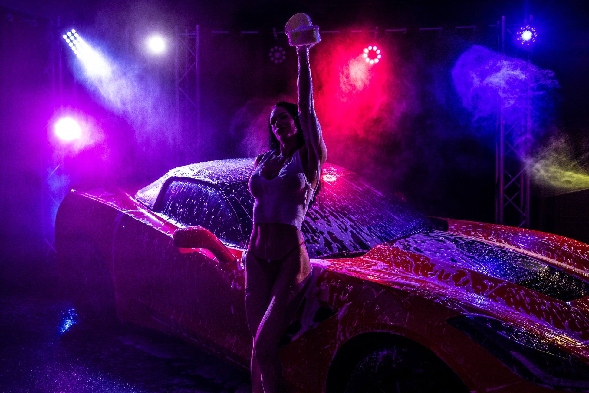 Artistic neon boudoir portrait in red and purple lighting at Studio SJ in Wisconsin.